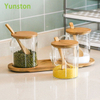 Glass kitchen jar storage set Food grade kitchen condiment jar with wooden lid and wooden spoon Kitchen spice jar with handle